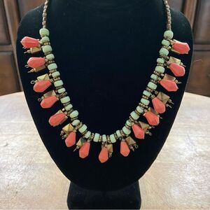 Vintage southwestern style turquoise and coral colored beaded short necklace.